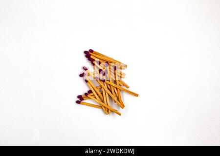 Group of long wooden matches isolated on white background. Stock Photo