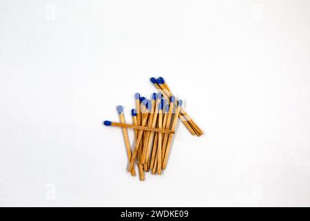 Group of long wooden matches isolated on white background. Stock Photo