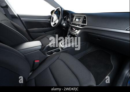 Car interior with cloth seats and isolated  windows and dash panel Stock Photo