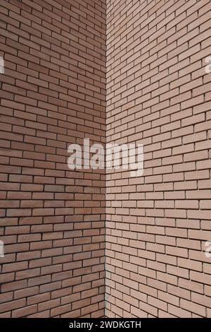 Red brick wall corner building masonry background. Architectural detail. Stock Photo