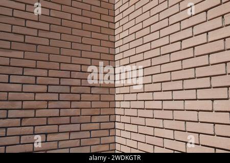 Red brick wall corner building masonry architectural detail. Background texture. Stock Photo