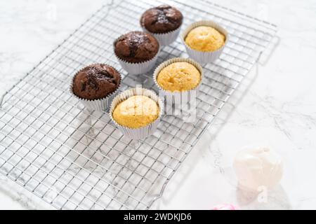 Creating Extravagant Cupcakes for Birthday Celebration Stock Photo