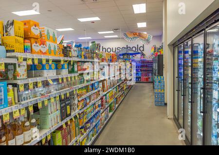 View of shelves with products and refrigerators with refreshing drinks in the CVS store. Miami Beach. USA. Stock Photo