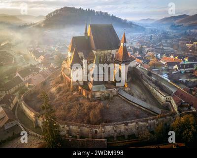 The medieval Saxon village of Biertan and its fortified church during a dreamy morning. Photo taken on 29th of December 2023 in Biertan, Sibiu County, Stock Photo