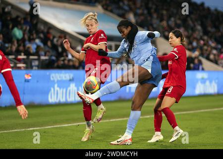 Manchester on Sunday 21st January 2024. City's Khadija Shaw battles with Liverpools Emma Koivisto during the Barclays FA Women's Super League match between Manchester City and Liverpool at the Joie Stadium, Manchester on Sunday 21st January 2024. (Photo: Chris Donnelly | MI News) Credit: MI News & Sport /Alamy Live News Stock Photo