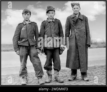 HITLER YOUTH ARMY Fourteen-year-old German boy teenagers, soldiers from Hitler Jugend Hitler Youth, captured by units of the US Army in April 1945. Berstadt, Hessen province, Germany Date: April 1945 Stock Photo