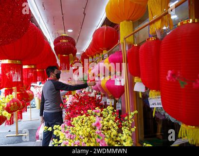 Kuala Lumpur, Malaysia. 21st Jan, 2024. An ethnic Chinese man shops for home decorations ahead of the Lunar New Year of the Dragon, more specifically, Wood Dragon, starting from February 10th, 2024, which will be celebrated by the Chinese around the world. (Photo by Wong Fok Loy/SOPA Images/Sipa USA) Credit: Sipa USA/Alamy Live News Stock Photo