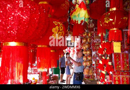 Kuala Lumpur, Malaysia. 21st Jan, 2024. An ethnic Chinese man shops for home decorations ahead of the Lunar New Year of the Dragon, more specifically, Wood Dragon, starting from February 10th, 2024, which will be celebrated by the Chinese around the world. (Photo by Wong Fok Loy/SOPA Images/Sipa USA) Credit: Sipa USA/Alamy Live News Stock Photo