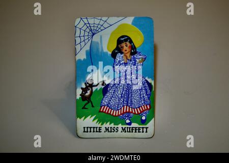 Little Miss Muffet and a big hairy spider Stock Photo