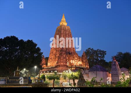 View of Mahabodhi Temple at dusk, seen from the south-east end, one of the earliest Buddhist temples built entirely in brick still standing in India Stock Photo