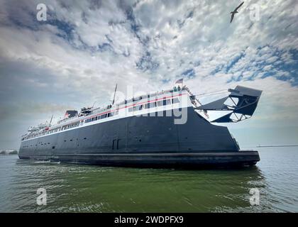 The SS Badger backs in to its stall in Manitowoc, Wisconsin ending it's trip from Ludington, Michigan. Stock Photo