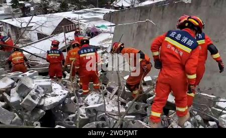 Tangfang Town, China. 22nd Jan, 2024.  rescuers working at the site of a landslide in Liangshui Village, Tangfang Town in the city of Zhaotong, southwest China's Yunnan Province. A total of 47 people were buried in a landslide that struck southwest China's Yunnan Province early Monday. More than 200 rescuers together with 33 firefighting vehicles and 10 loading machines were combing the debris to search for the missing, after the disaster happened in the Liangshui Village, Tangfang Town in the city of Zhaotong at 5:51 a.m. on Monday. Credit: Xinhua/Alamy Live News Stock Photo