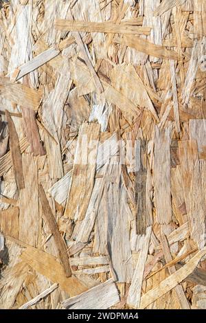 Plywood panel, OSB board texture. Simple pressed Oriented strand board chipboard pattern. Light wood background Stock Photo