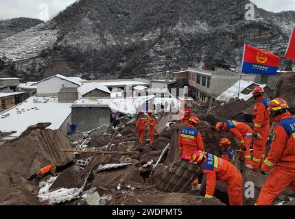 Tangfang Town, China. 22nd Jan, 2024. Rescuers work at the site of a landslide in Liangshui Village, Tangfang Town in the city of Zhaotong, southwest China's Yunnan Province, Jan. 22, 2024. A total of 47 people were buried in a landslide that struck southwest China's Yunnan Province early Monday. More than 200 rescuers together with 33 firefighting vehicles and 10 loading machines were combing the debris to search for the missing, after the disaster happened in Liangshui Village, Tangfang Town in the city of Zhaotong at 5:51 a.m. on Monday. Credit: Xinhua/Alamy Live News Stock Photo