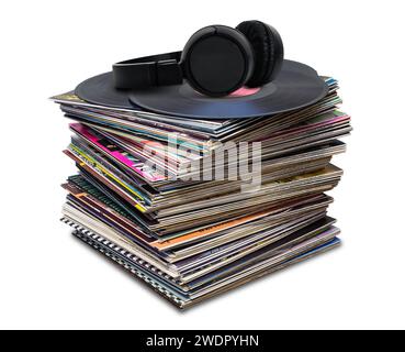 pile of old vinyl discs and headphones isolated on white background Stock Photo