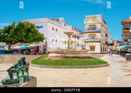 Chiriva Square with sculpture and fountain in Carihuela district in Torremolinos. Andalusia, Spain Stock Photo
