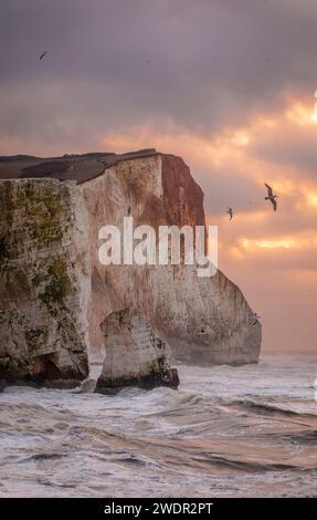 Storm Isha brewing at Seaford head on the east Sussex coast during high tide and sunrise south east England UK Stock Photo