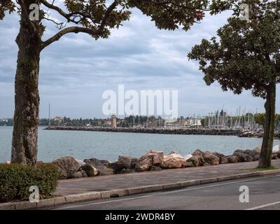 DESENZANO DEL GARDA, ITALY - SEPTEMBER 22, 2023:  View along the lake shore Stock Photo