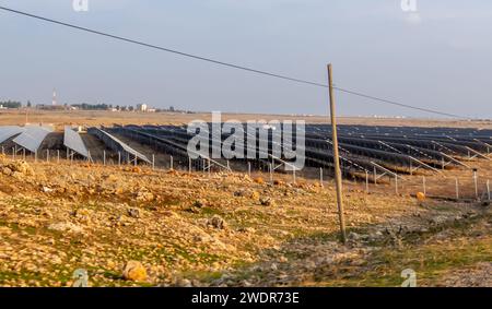 Solar panels farm in the fields near Midyat Southeastern Turkey Stock Photo