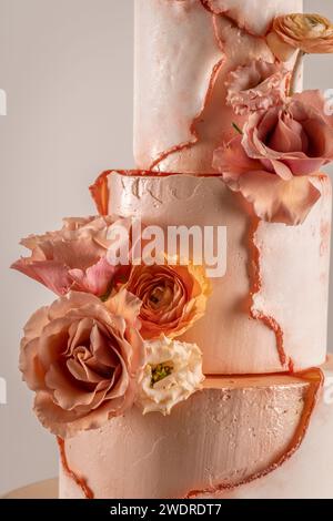 Simple wedding cake with flowers, close up Stock Photo