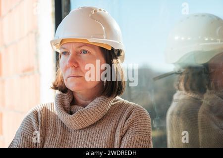 Portrait of female architect on construction site, selective focus Stock Photo
