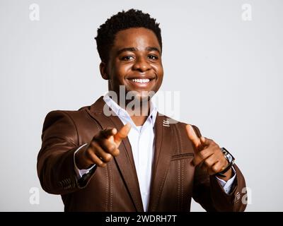 Portrait of happy businessman who is smiling and looking at camera. Copy space on image for your text or advert. Stock Photo