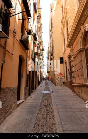 Photograph taken in the city of Cagliari, Italy, showcasing the picturesque and lengthy alleys of the city Stock Photo