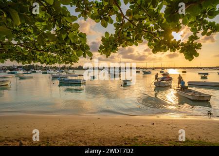 View of boats on the water in Grand Bay at golden hour, Mauritius, Indian Ocean, Africa Stock Photo