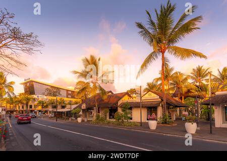 View of palm trees and boutique shops in Grand Bay at sunset, Mauritius, Indian Ocean, Africa Stock Photo