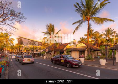 View of palm trees and boutique shops in Grand Bay at sunset, Mauritius, Indian Ocean, Africa Stock Photo