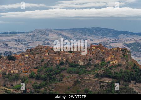 The small wonderful town of Calascibetta on top of a rocky hill in the Sicilian countryside, Enna province, Sicily, Italy, Mediterranean, Europe Stock Photo
