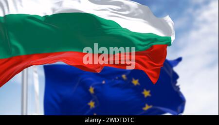 Flags of Bulgaria and the European Union waving in the wind on a clear day. Bulgaria became a member of the EU in January 2007. 3d illustration render Stock Photo