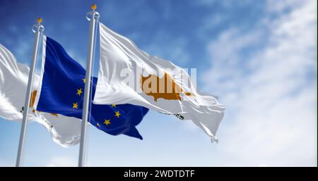 Cyprus national flag waving in the wind with the European Union flag on a clear day. 3d illustration render. Fluttering fabric. Stock Photo