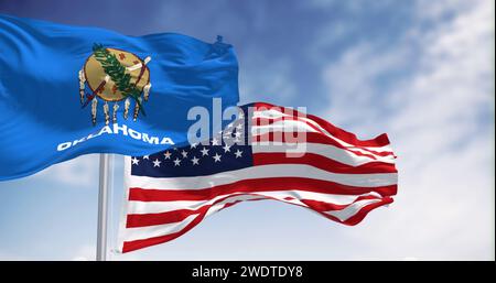 The Oklahoma state flag waving the american national flag. Oklahoma is a state in the South Central region of the United States. 3d illustration rende Stock Photo
