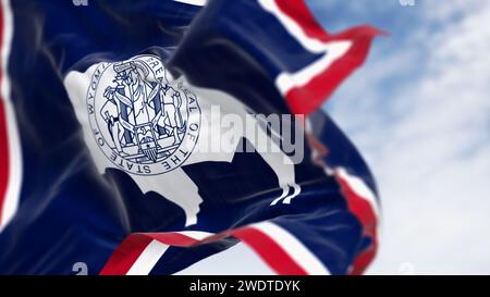 Close-up of Wyoming state flag waving in the wind. White Bison silhouette. 3d illustration render. Selective focus. US state flag Stock Photo