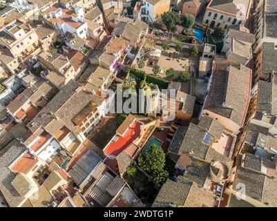 Remains of a 16th-century Begur castle fort atop a forested hill, with panoramic views of the Mediterranean Sea on the Costa Brava Spain Stock Photo