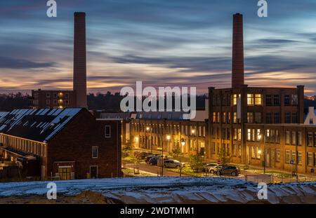 Enka neighbourhood in the city of Ede, Province Gelderland, by sunset. Modern residential area encompassing restored industrial buildings Stock Photo