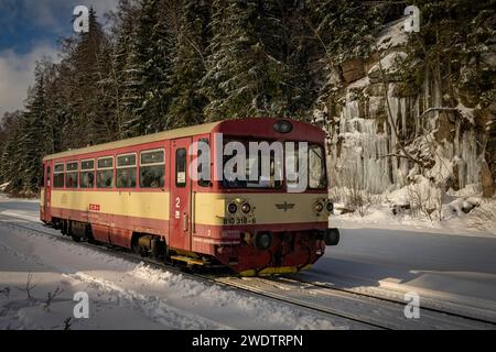 Korenov, Czech Republic. 20th Jan, 2024. Czechoslovak motor coach CD Class 810, this year's first run of historic trains on the rack railway in Korenov, Czech Republic, January 20, 2024. Rack railway track Tanvald - Korenov - Harrachov was put into operation on 01 June 1902. The track runs through difficult terrain and required extraordinary technical solutions. Credit: Radek Petrasek/CTK Photo/Alamy Live News Stock Photo