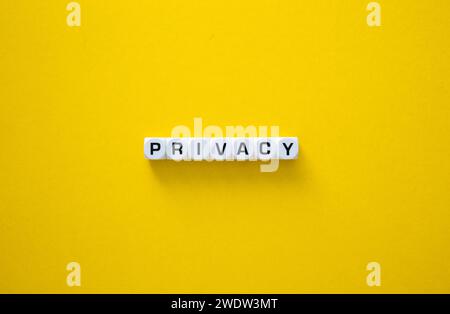 Privacy word and concept. Block letters on yellow background Stock Photo