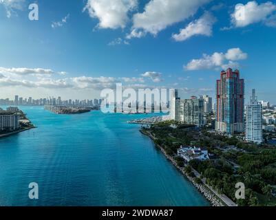 Aerial view of turquoise water of Government cut, busy waterway connecting the ocean to Miami cruise port, Fisher Island, South Beach Stock Photo