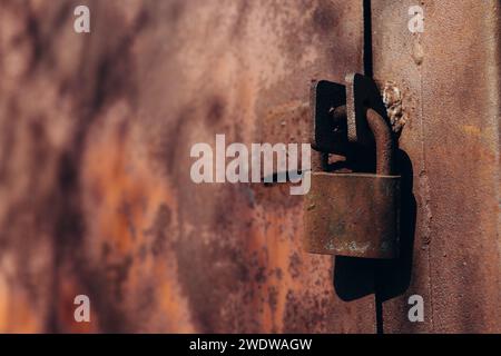 a rusty lock on the door Stock Photo