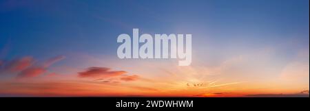 Beautiful dramatic cloudscape at sunset with clouds. Aerial view. Stock Photo