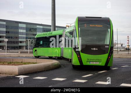 MALMO, SWEDEN - OCTOBER 26, 2014: VanHool ExquiCity 24 CNG articulated bus of Skanetrafiken public transportation company in Malmo driving quickly Stock Photo