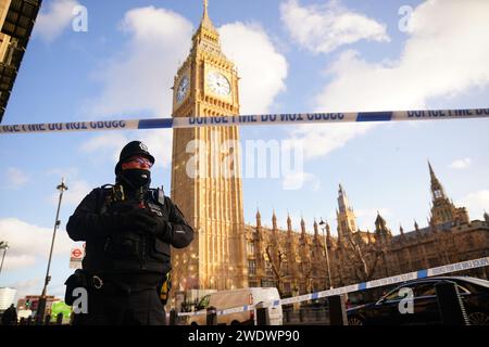 Police cordon off an area around Portcullis House, London, after debris fell from a building following high winds. Thousands of people have been left without power as Storm Isha brought disruption to the electricity and transport networks across the UK. Picture date: Monday January 22, 2024. Stock Photo