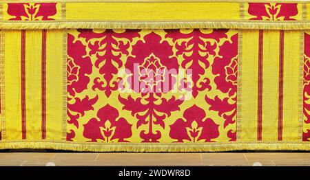 Decorated altar cloth frontal on the main altar in the chancel of the medieval english cathedral at York, England. Stock Photo