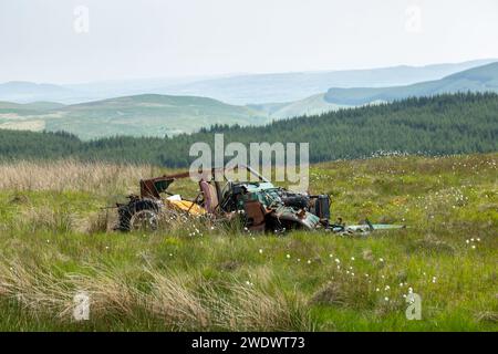 An old off road car left to rot on the hills near Steele’s Knowe from Corb Glen Stock Photo