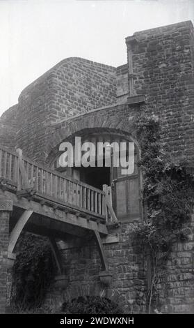 1960s, historical, view of the wooden bridge over the moat at the rear of Walmer castle, an ancient tudor fortress on the Kent coast, England, UK. The building dates back to 1540 and Henry VIII, one of several castles constructed by the King at the Cinque Ports to defend the English coast aganist a possible french invasion. Stock Photo