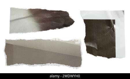 Torn black and gray magazine paper on white background with clipping path Stock Photo