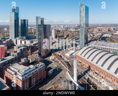 Aerial photograph of Manchester Central, Beetham Tower, AXIS, Deansgate Square, the tower of light & train & tram lines in Manchester city centre, UK Stock Photo