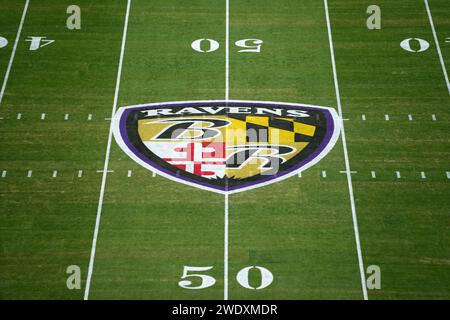 The Baltimore Ravens logo at midfield during the AFC Divisional Playoff game between the Ravens and the Houston Texans at M&T Bank Stadium on January 20, 2024 in Baltimore, Maryland. Stock Photo